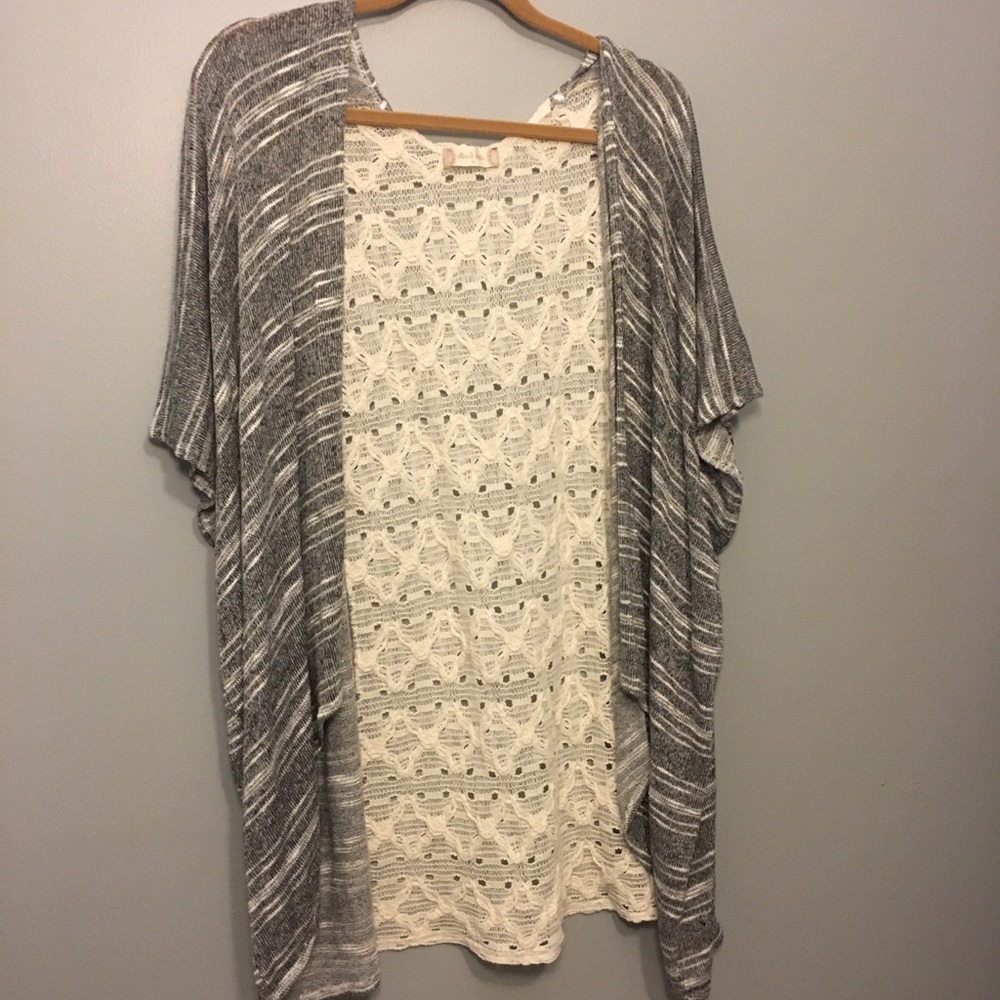 Knitted shawl with white lace back